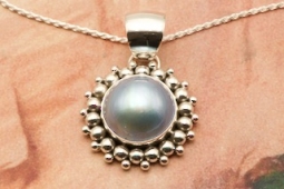 Artie Yellowhorse Genuine Mabe Pearl Sterling Silver Rising Sun Pendant